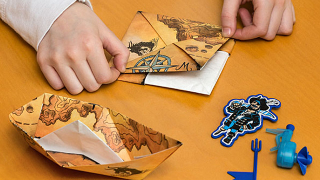 Illustration for article titled Power Your Origami Paper Boat With This Tiny Outboard Motor